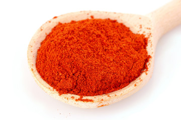 Spices in spoon isolated on white