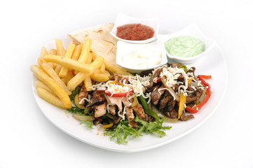 Mixed slices of chicken beef steak potato,mozzarella,sauce