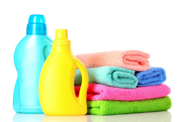 Detergent and towels isolated on white