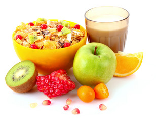 Yoghurt, muesli, milk and fruits isolated on white
