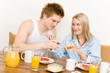 Obraz na płótnie Canvas Breakfast happy couple enjoy romantic morning