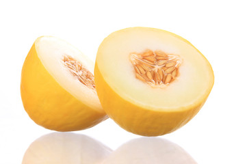 Close-up of melon over white background