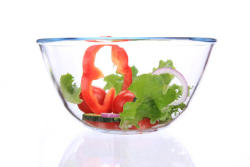 Fresh salad in a glass bowl