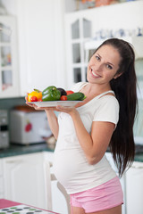 Pregnant woman and healthy food