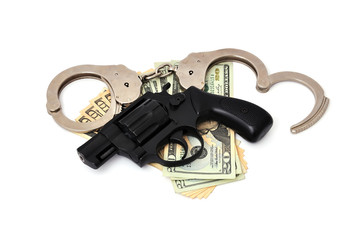 revolver,  dollars and the handcuffs