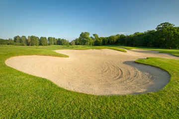 Idyllic golf course with sand banks