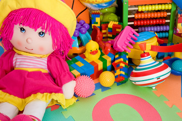 Fototapeta na wymiar huge pile of various colorful children's toys.