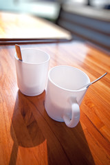 Two cups on table