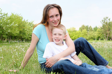 Naklejka na ściany i meble mother with her son outdoors