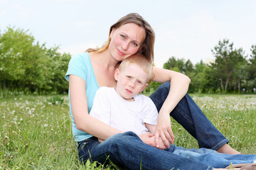 Fototapeta premium mother with her son outdoors