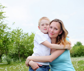 Fototapeta premium mother with her son outdoors