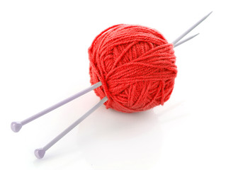 knitting needles and wool ball isolated on white