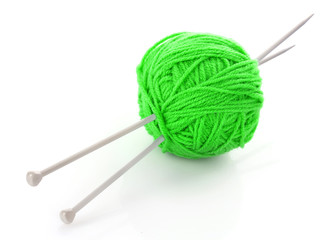 knitting needles and wool ball isolated on white