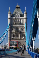 Fototapeten Tower Bridge with red bus in London, UK © Tomas Marek