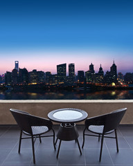 Terrasse, vue sur une ville de nuit