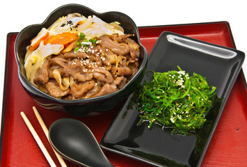 rice with fried pork and seaweed Salad