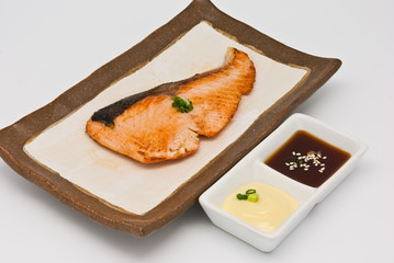 Salmon fish grilled in the plate