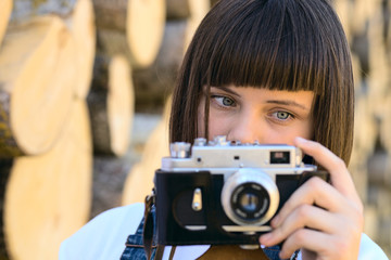 girl  with old camera.