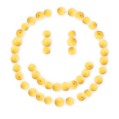 Smile made of apricots with shadow