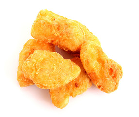 Fried chicken pieces isolated on white