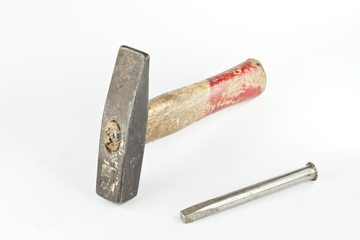 Old hammer and nail