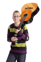boy carrying a guitar