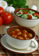 Meatballs in tomato sauce.