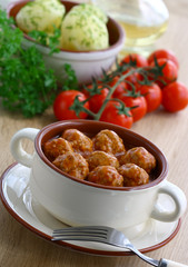 Meatballs in tomato sauce.