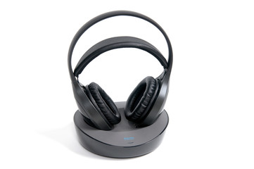 Wireless headphones with base isolated on white background