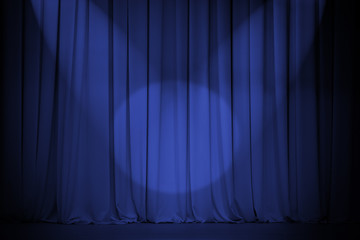 theatre blue curtain with two lights cross