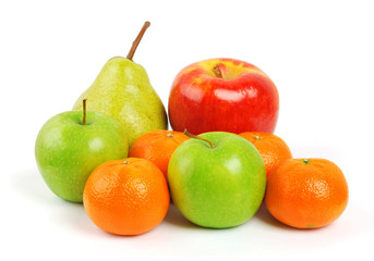 fruit plate with citrus fruits, apples, banana, plum