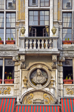Balcony with a statue and vases. Brussels. Fragment.