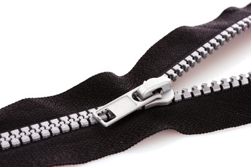 Black zipper closeup isolated on white
