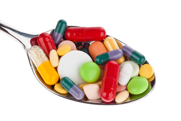Tablets and medicines on spoon