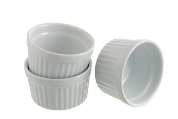 Three white ceramic individual baking pans