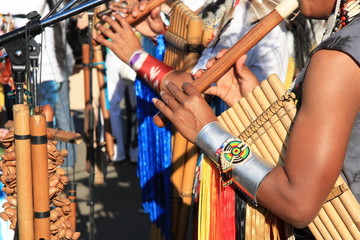 Native South American tribal group from Ecuador play music - obrazy, fototapety, plakaty