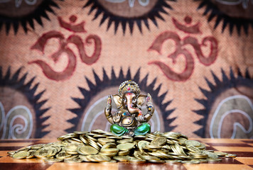 Ganesh on heap of coins