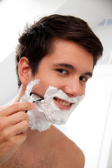 Man shaves with a razor blade And Rasierschau