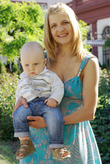 Beautiful woman with a baby