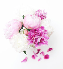 peonies in a glass