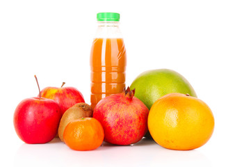 bottle of juice  with ripe fruits on white background