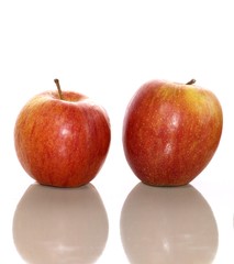 Fresh red apples on a white background