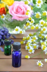 Obraz na płótnie Canvas essential oils with herbs