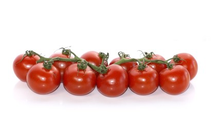 Fresh cherry tomatoes isolated on white