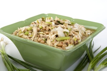 White chicken chili in green ceramic dish