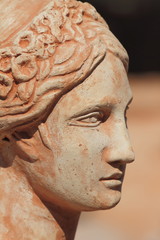 beautiful terracotta female face profile, Italy