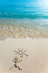 Children s picture on sand-the person and the sun..