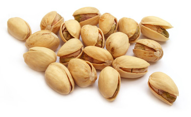 Pistachios isolated over white background