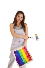 woman rainbow paint roller