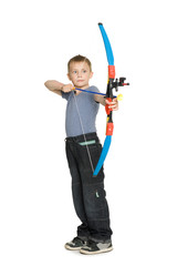 Boy shooting a bow